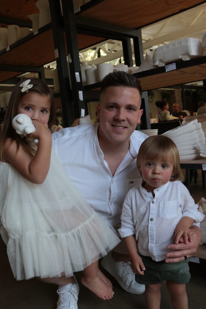 Family enjoying Easter activities at Clay Café