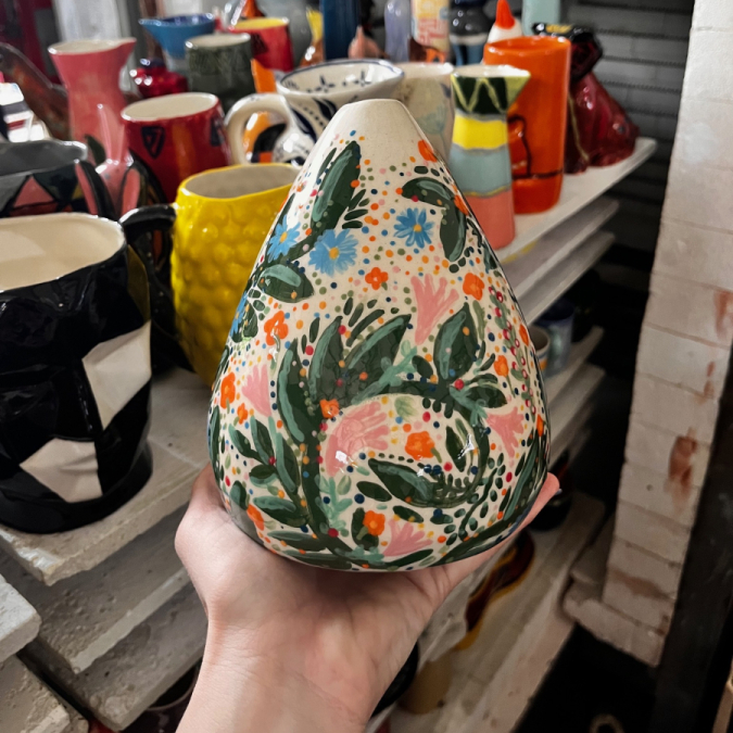 Painted pottery vase created at a group activity at Clay Cafe Paarl.